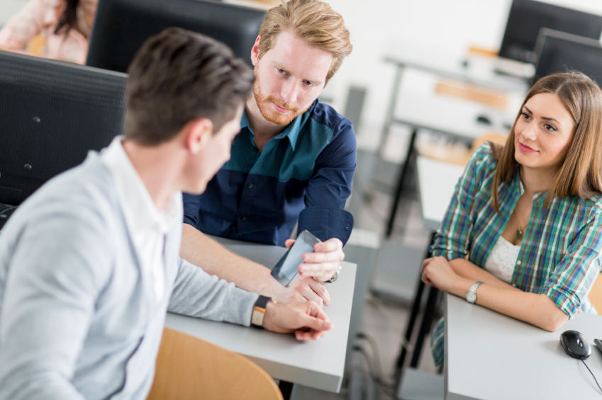 Young students talking in a classroom